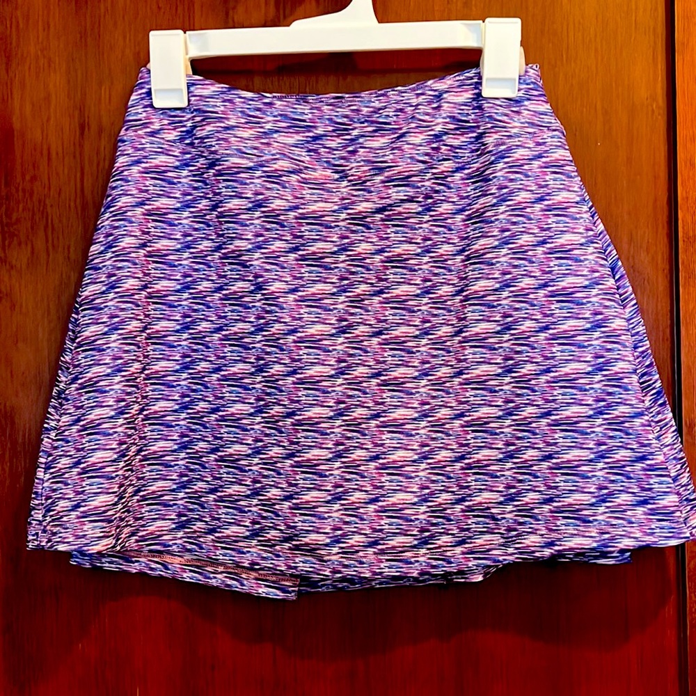 Zealotpower Tennis or Golf skirt, size small. NWOT. Purples, blue, and white.
